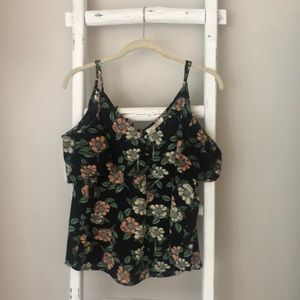 Floral print cold shoulder blouse.